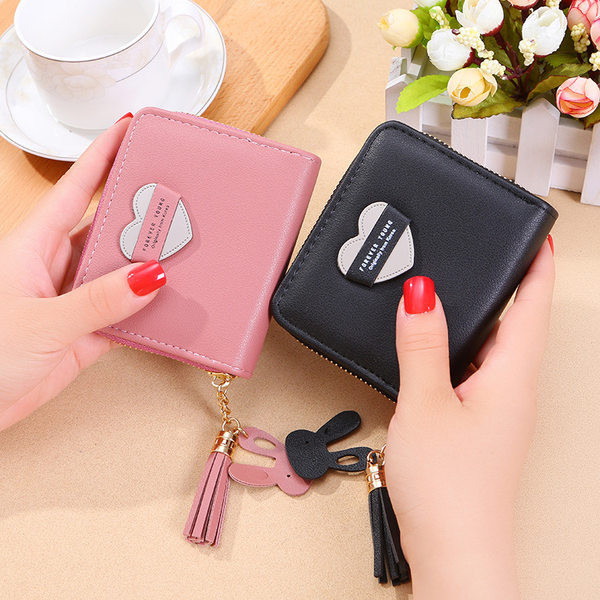 Mazs ādas maciņš ar pušķi vairākās krāsās