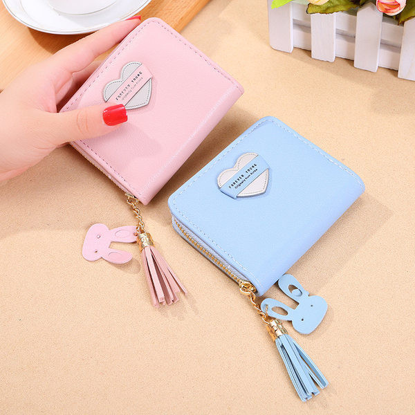 Mazs ādas maciņš ar pušķi vairākās krāsās