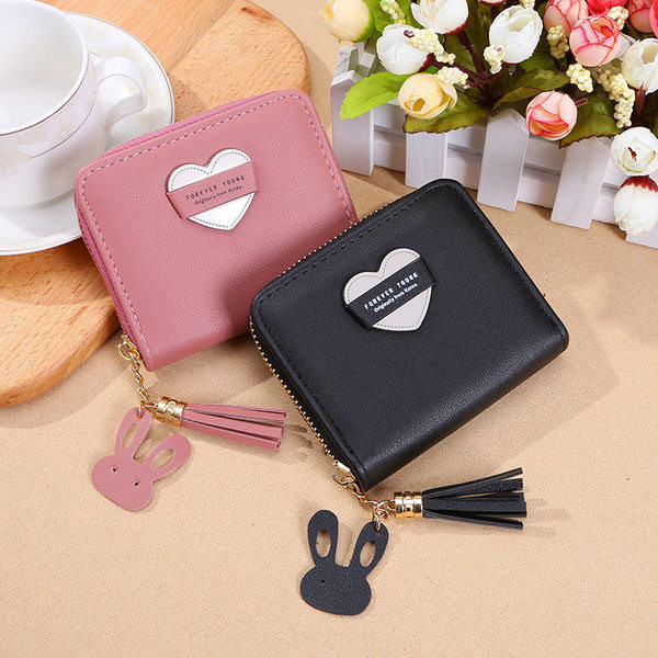 Mazs ādas maciņš ar pušķi vairākās krāsās