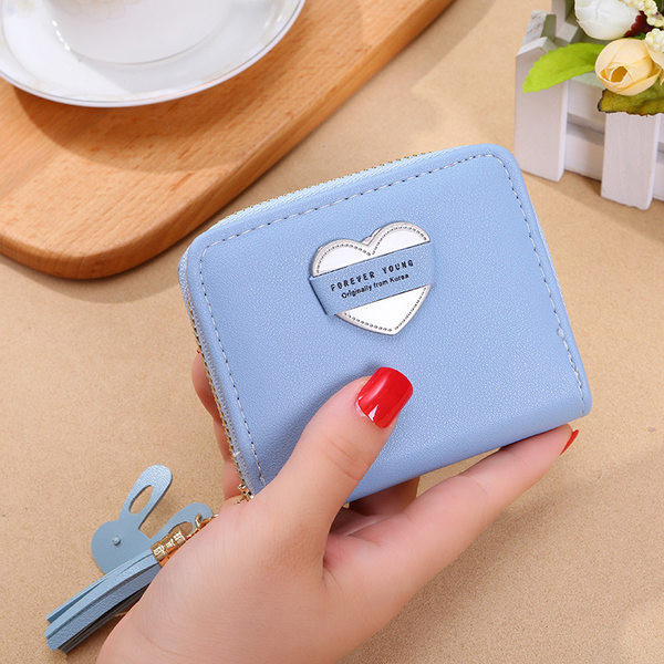 Mazs ādas maciņš ar pušķi vairākās krāsās