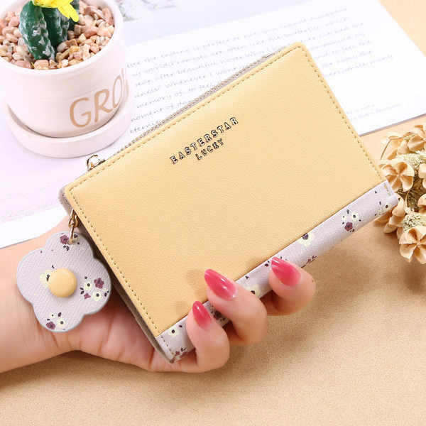 Νέο μοντέλο γυναικείο έκο δερμάτινο πορτοφόλι με μεταλλικό κούμπωμα και τσέπη με κέρματα