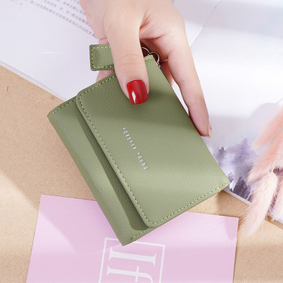 Μικρό γυναικείο πορτοφόλι με φερμουάρ και επιγραφή