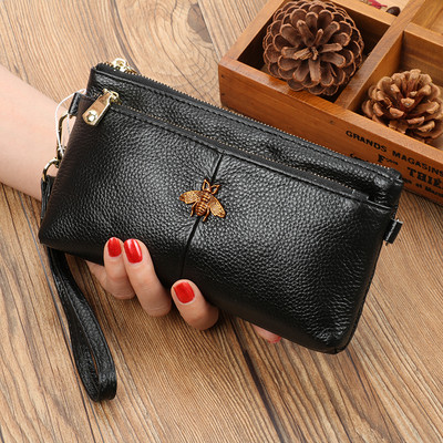 Jauna modeļa ādas maciņš ar diviem nodalījumiem un rāvējslēdzēju