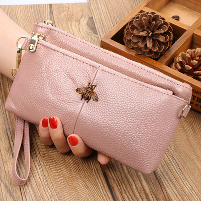 Jauna modeļa ādas maciņš ar diviem nodalījumiem un rāvējslēdzēju