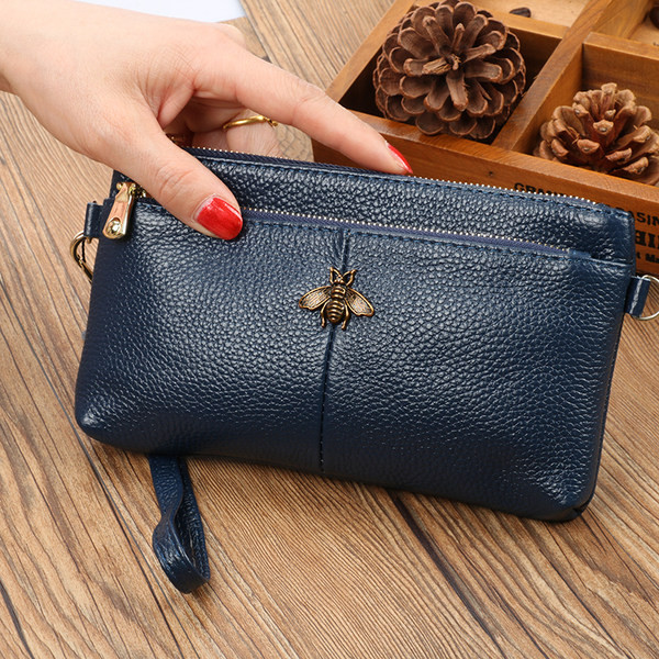 Jauna modeļa ādas maciņš ar diviem nodalījumiem un rāvējslēdzēju