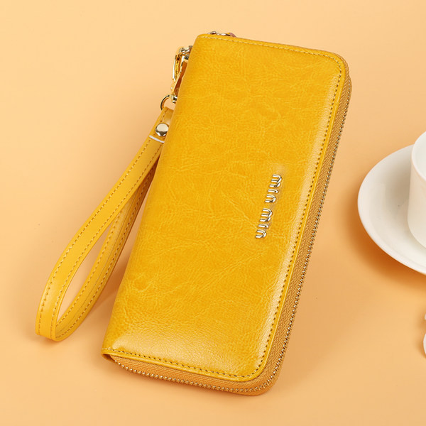 Μοντέρνο γυναικείο πορτοφόλι κλασικό μοντέλο με μεταλλική επιγραφή