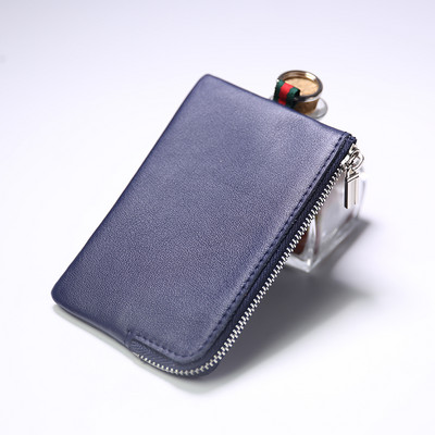 Γυναικείο μίνι δερμάτινο πορτοφόλι με φερμουάρ