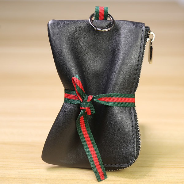 Γυναικείο μίνι δερμάτινο πορτοφόλι με φερμουάρ