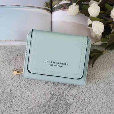 Sieviešu ādas somiņa ar rāvējslēdzēju un uzrakstu