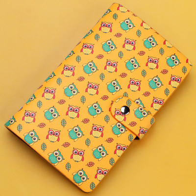 Γυναικείο έκο δερμάτινο πορτοφόλι με μεταλλική στερέωση και έγχρωμο απλικέ