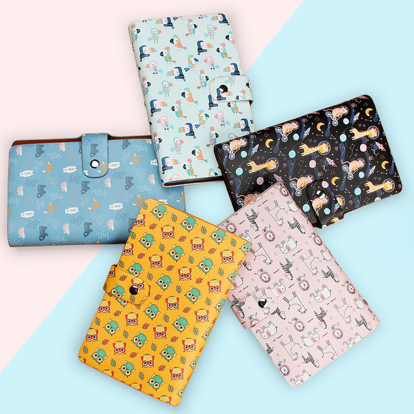 Γυναικείο έκο δερμάτινο πορτοφόλι με μεταλλική στερέωση και έγχρωμο απλικέ