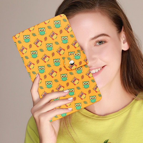 Γυναικείο έκο δερμάτινο πορτοφόλι με μεταλλική στερέωση και έγχρωμο απλικέ