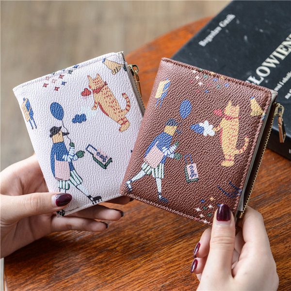 Γυναικείο πορτοφόλι με απλικέ και μέταλλο φερμουάρ