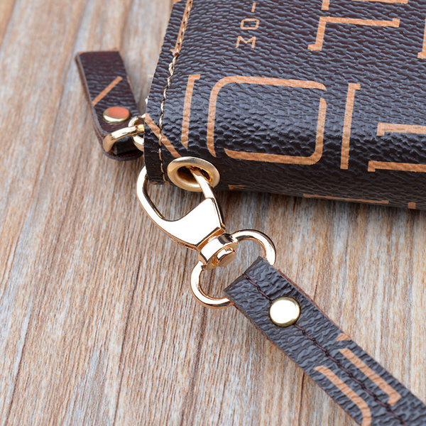 Πολυλειτουργικό πορτοφόλι με διπλό φερμουάρ και μεταλλική επιγραφή