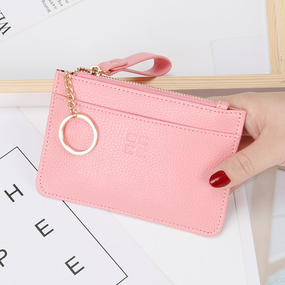 Γυναικείο έκο δερμάτινο πορτοφόλι με φερμουάρ και μενταγιόν