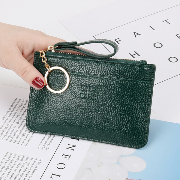 Γυναικείο έκο δερμάτινο πορτοφόλι με φερμουάρ και μενταγιόν