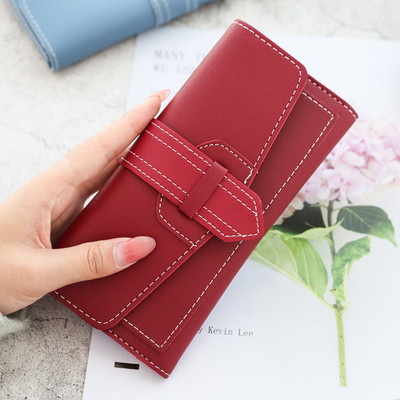 Κομψό γυναικείο πορτοφόλι με μεταλλικό κούμπωμα