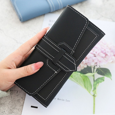 Κομψό γυναικείο πορτοφόλι με μεταλλικό κούμπωμα