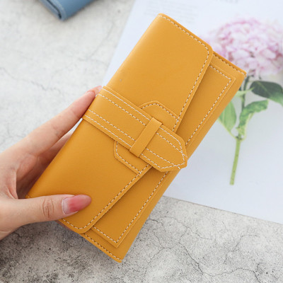 Κομψό γυναικείο πορτοφόλι με μεταλλικό κούμπωμα