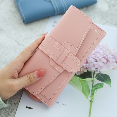 Κομψό γυναικείο πορτοφόλι με μεταλλικό κούμπωμα