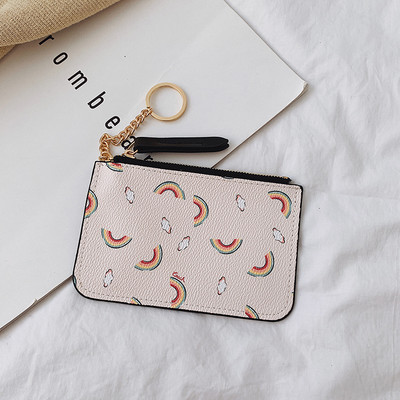 Γυναικείο πορτοφόλι με φερμουάρ και απλικέ