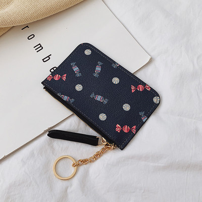 Γυναικείο πορτοφόλι με φερμουάρ και απλικέ