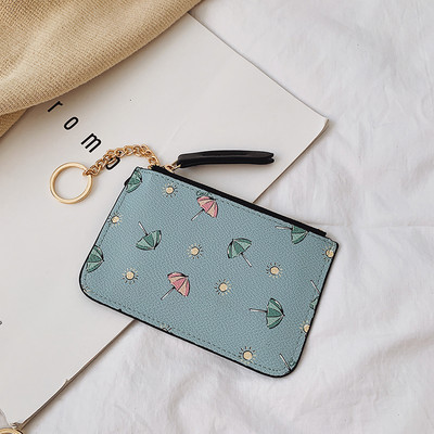 Γυναικείο πορτοφόλι με φερμουάρ και απλικέ