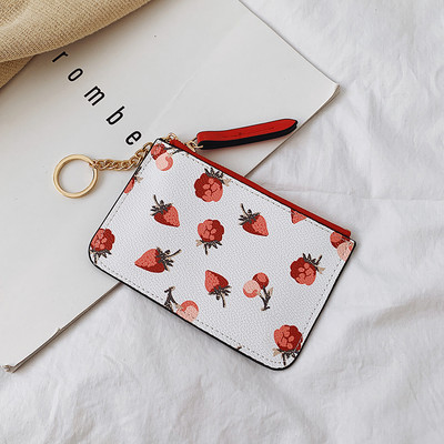 Γυναικείο πορτοφόλι με φερμουάρ και απλικέ