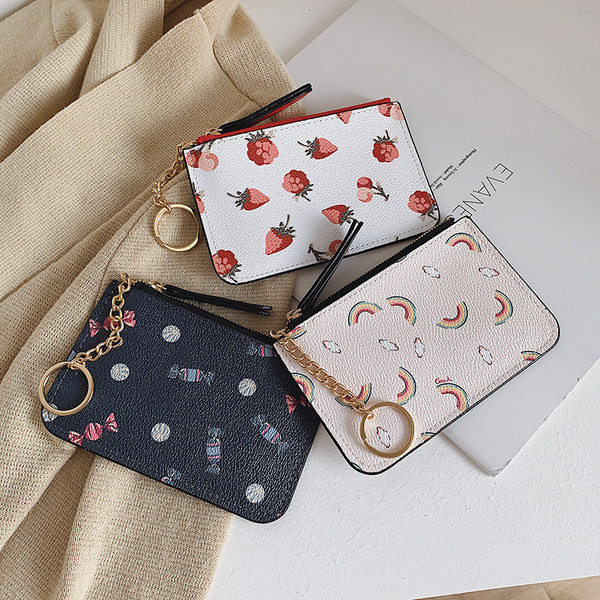 Γυναικείο πορτοφόλι με φερμουάρ και απλικέ