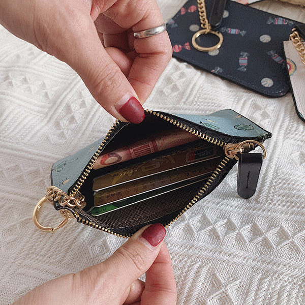 Γυναικείο πορτοφόλι με φερμουάρ και απλικέ