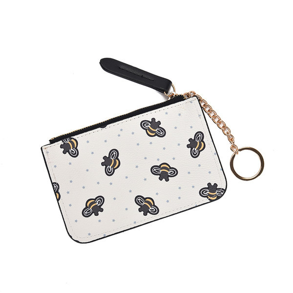 Γυναικείο πορτοφόλι με φερμουάρ και απλικέ