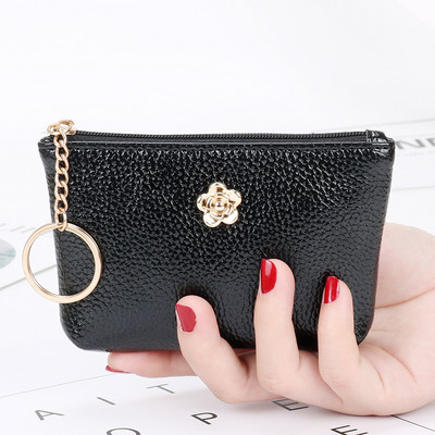 Γυναικείο έκο δερμάτινο πορτοφολι με μεταλλική διακόσμηση