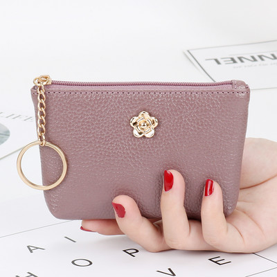 Γυναικείο έκο δερμάτινο πορτοφολι με μεταλλική διακόσμηση