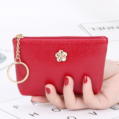 Γυναικείο έκο δερμάτινο πορτοφολι με μεταλλική διακόσμηση