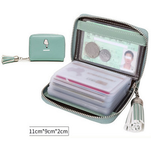 Μικρό γυναικείο πορτοφόλι από οικολογικό δέρμα για έγγραφα με φούντα