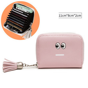 Μικρό γυναικείο πορτοφόλι από οικολογικό δέρμα για έγγραφα με φούντα