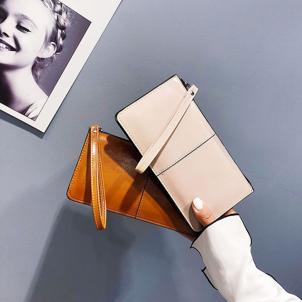 Γυναικείο πορτοφόλι με πολλά διαμερίσματα με φερμουάρ και λαβή