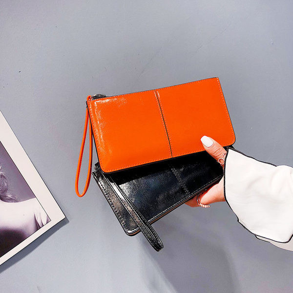 Γυναικείο πορτοφόλι με πολλά διαμερίσματα με φερμουάρ και λαβή