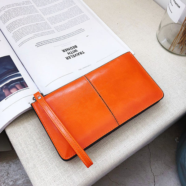 Γυναικείο πορτοφόλι με πολλά διαμερίσματα με φερμουάρ και λαβή