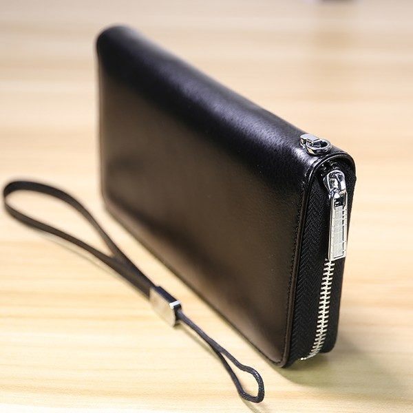 Sieviešu ādas somiņa ar rāvējslēdzēju un debetkaršu nodalījumiem