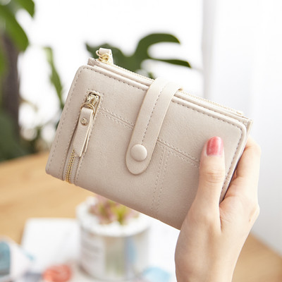 Γυναικείο έκο δερμάτινο πορτοφόλι με φερμουάρ και μεταλλικό κούμπωμα σε διάφορα χρώματα