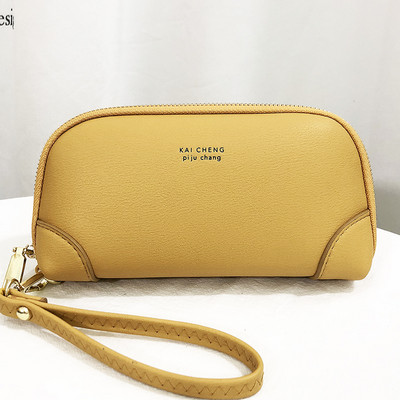 Γυναικείο έκο δερμάτινο πορτοφόλι με επιγραφή και λαβή