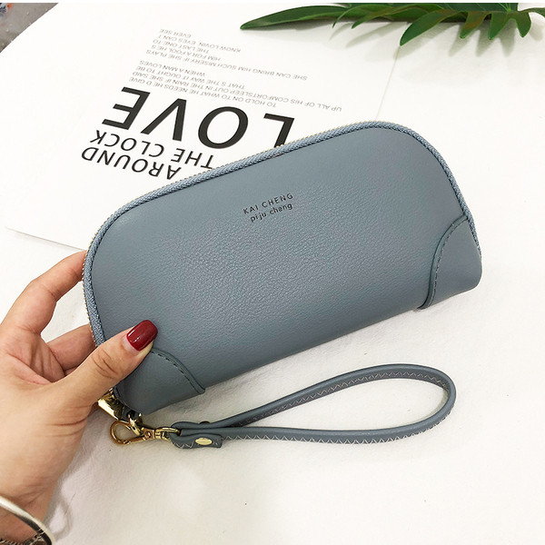 Γυναικείο έκο δερμάτινο πορτοφόλι με επιγραφή και λαβή