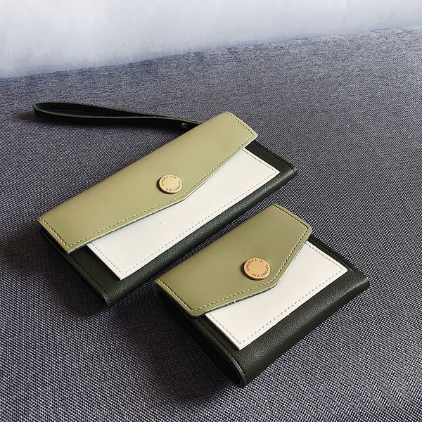 Γυναικείο έκο δερμάτινο πορτοφόλι με μεταλλική στερέωση - δύο μοντέλα 