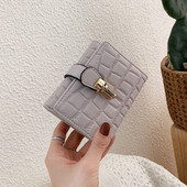 Έκο δερμάτινο πορτοφόλι από μοντέρνο γυναικείο με μεταλλική στερέωση