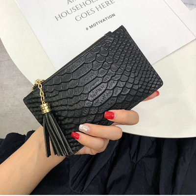 Sieviešu ādas somiņa ar rāvējslēdzēju un pušķi