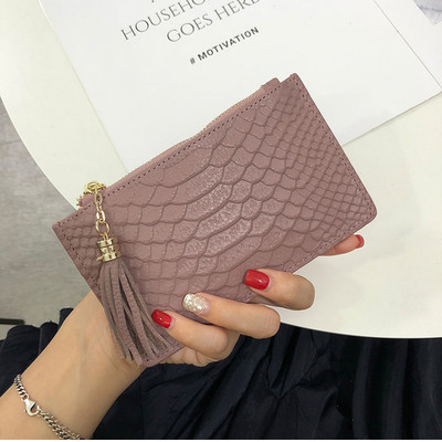 Sieviešu ādas somiņa ar rāvējslēdzēju un pušķi