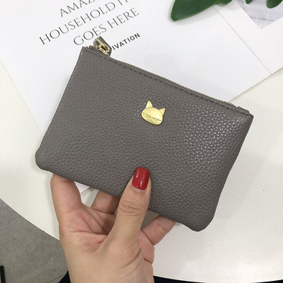 Γυναικείο έκο δερμάτινο πορτοφόλι με μεταλλική διακόσμηση