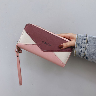 Γυναικείο πορτοφόλι με λαβή και επιγραφή από οικολογικό δέρμα