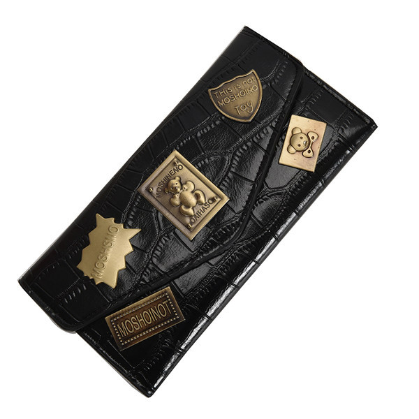 Γυναικείο πορτοφόλι από οικολογικό δερμάτινο και μεταλλικές διακοσμήσεις